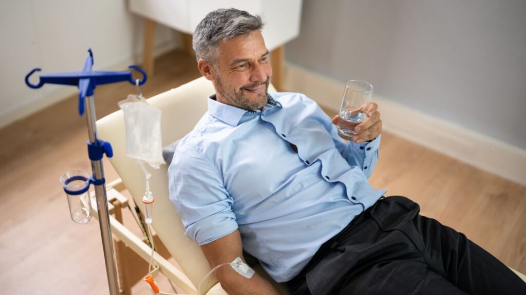 Man receiving an IV drip