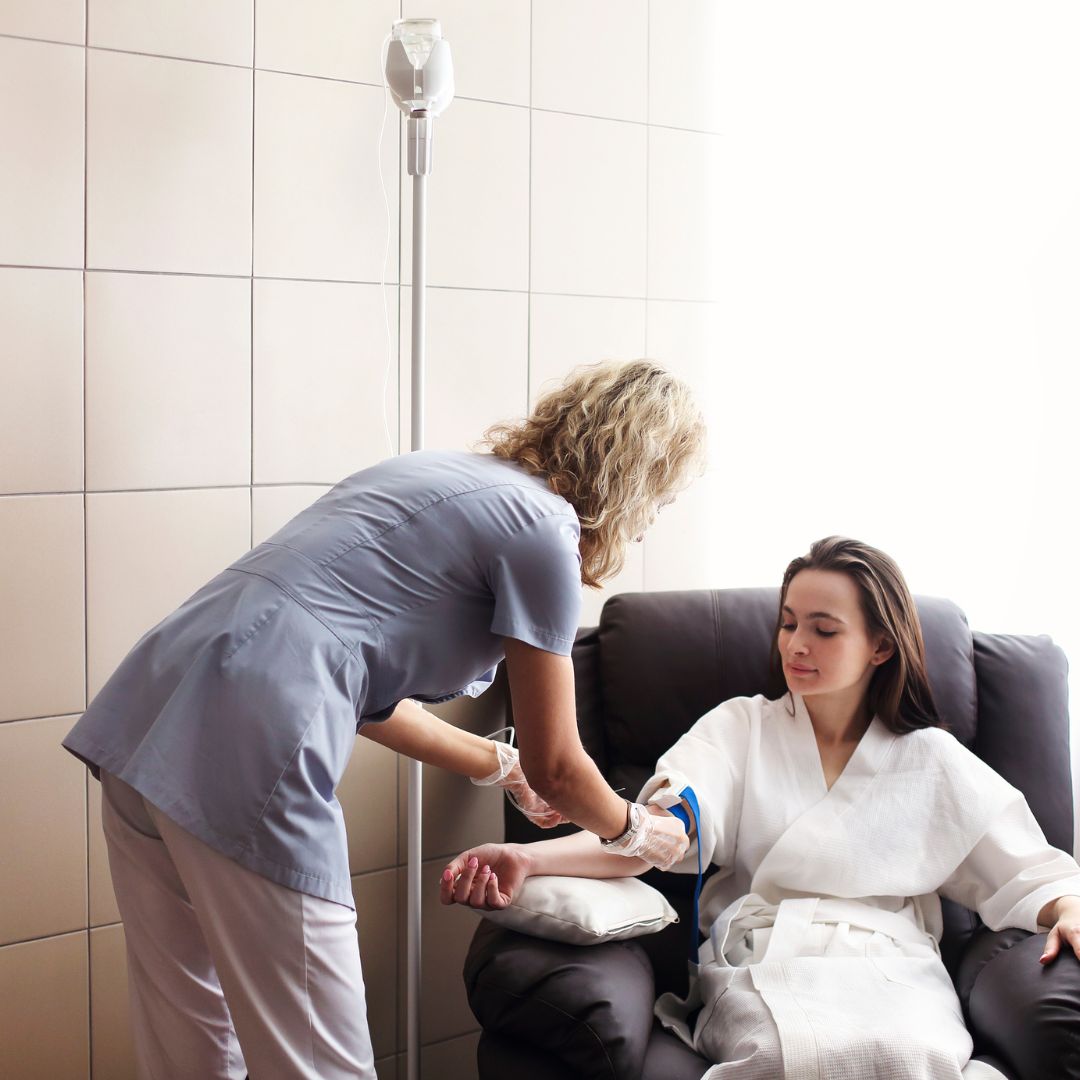 woman getting iv therapy
