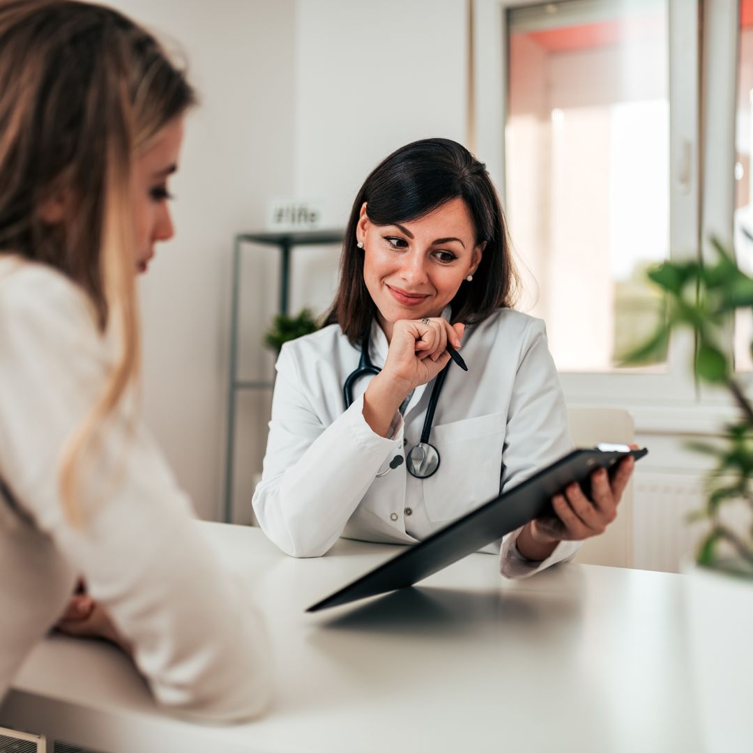 woman talking to doctor