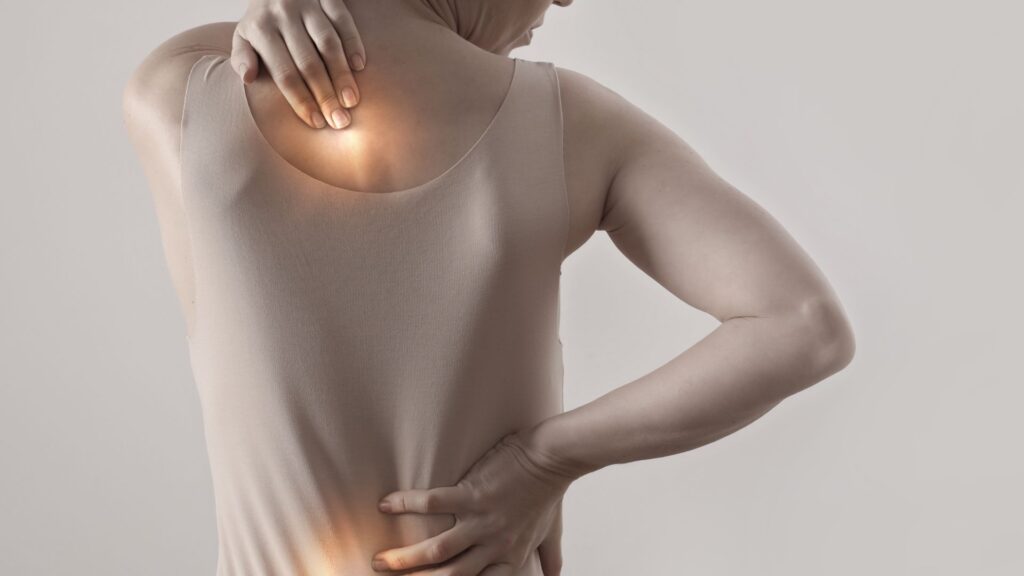 woman with neck and back pain