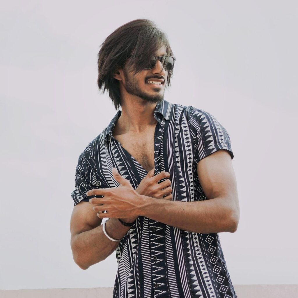 a man smiling with healthy hair