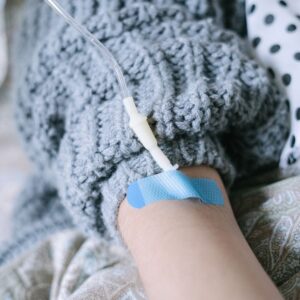 IV in a person's arm